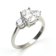 Image of Oval and Round cut Moissanite Trilogy 9ct Gold UK Hallmarked
