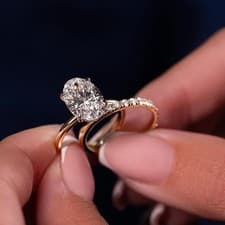 Image of Moissanite Bridal Set 2.20 CTW Oval Cut Engagement Ring 14K Yellow Gold Plated