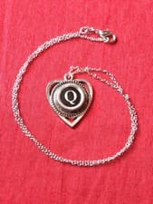 Image of Sterling silver necklace with letter "Q" initial pendant