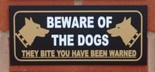 Image of Beware of the dogs they bite you have been warned sign - All Materials