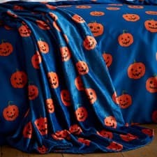 Image of Catherine Lansfield Halloween Pumpkins Cosy Fleece 130x170cm Blanket Throw Navy