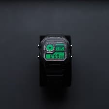 Image of Black CASIO AE1200 Watch - Custom Green Filter. Brand New with Box and Papers