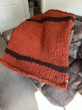 Image of Handmade Chunky Knit Cosy Throw In A Gorgeous Russet Colour. 35in x 45in