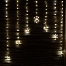 Image of 1.2m Battery Operated Snowflake Curtain Christmas Light with 147 Warm White LEDs