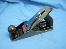 Image of Stanley Bailey no 4.1/2 smoothing plane with hardwood handles in nice condition.