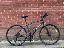 Image of Trek FX 3 Disc Hybrid Bike 2025 Galactic Grey lightweight Alpha Aluminum frame