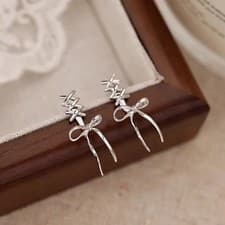 Image of Ribbon Ear Cuff Earrings Bow Knot Style Polished Metal Clip On Women Jewelry