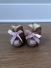 Image of UGG Pink Satin Jesse Bow II Boots NWOT Infant Girl Size 0/1 Chestnut Brown Suede