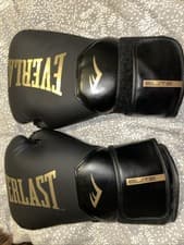 Image of Everlast Pro Style Elite 14Oz Boxing Gloves - Black and Gold With Hand Wraps