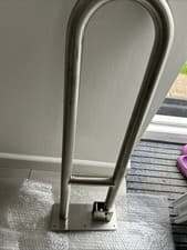 Image of Wall Mounted Chrome drop down handrail