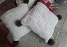 Image of £44 Tags Pair Of Dunelm Cream Pom Pom Cable Knit Cushion House Decor New