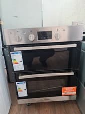 Image of Brand new indesit electric intergrated double ovens 70cm