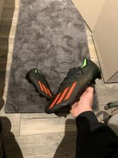 Image of Black and red adidas X . 1 FG football boots