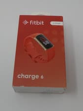 Image of Fitbit Charge 6 - Smartwatch Coral & Gold - Brand New Sealed