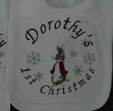 Image of Peter Rabbit Personalised Embroidered 1st Christmas Sleepsuit and Bib Set