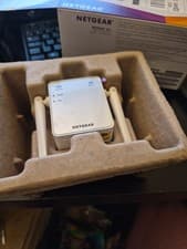 Image of Netgear EX2700 N300 Wireless WiFi Network Range Extender White
