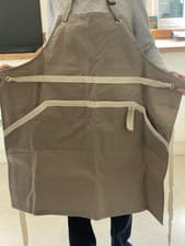 Image of LE CREUSET CHEF’S APRON ADJUSTABLE NECK STRAP 100% COTTON BEIGE COLOUR ONE SIZE