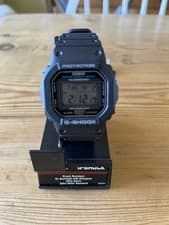 Image of Casio G-Shock DW-5600E-1V New in box with Tags & Papers