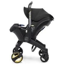 Image of Doona™ Car Seat & Stroller-Nitro Black With Newborn Insert
