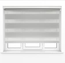 Image of Day and Night roller blinds zebra effect