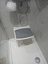 Image of AKW 2000 Series Grey Compact Fold-Up Padded Shower Seat
