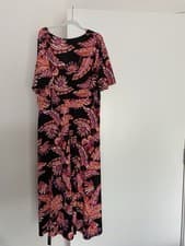 Image of Leaf Print Pink Wrap Over Front dress In a midi/ maxi length