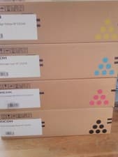 Image of Ricoh print cartridges (black, yellow, magenta, cyan)
