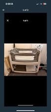 Image of Snuz Pod Green Cotton Crib Next to Me