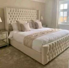 Image of Arian Chesterfield Ottoman Storage Gas Lift Winged Bed Frame Velvet Upholstered