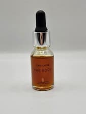 Image of Tan-Luxe the BODY Self Tan Drops, Light/Medium (15 Ml) Add Tanning Drops to Skin
