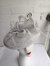 Image of Sinamay Petunia Flower Fascinator with A Saucer Base