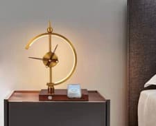 Image of Modern LED Gold and Oak Luxury Clock Shaped Table Lamp Including Charging Dock