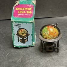 Image of Antique Finished Die-Cast Miniature Pencil Sharpener - Globe - Old Map Tartaria
