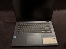 Image of A sleek 14” ASUS Vivobook Go with Celeron, 4GB RAM and 128GB storage.