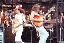 Image of Mike Levine and Rik Emmett of Triumph perform at the US Festival o- 4x6 Photo