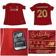 Image of New Balance Liverpool FC 19/20 Home Champions Shirt Junior Size XLB / 12-13Y