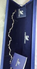 Image of Swarovski Silver Chain Bracelet Clear Crystal Wave Round Stones Lobster Clasp