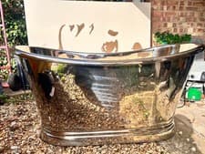 Image of Luxury freestanding chrome roll top bath tub