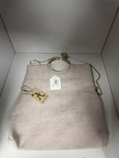 Image of Accessorize branded handbag, featuring a metal ring handle and a chain strap.