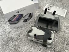 Image of GENUINE BRAND NEW DJI Mini 4 Pro Drone with RC2 Controller