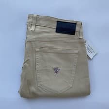 Image of Guess Men’s Slim Tapered Jeans In Khaki Coated Wash Finished Size 34X32