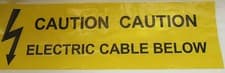 Image of CAUTION UNDERGROUND ELECTRIC CABLE BELOW WARNING  TAPE CUT LENGTHS 