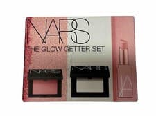 Image of NARS The Glow Getter Set. Blush, Light Reflecting Setting Powder And Lip Balm.