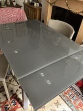 Image of Smoked Grey Glass Top Extending Dining Table. Seats 6.