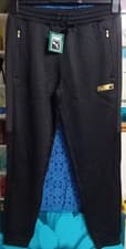 Image of PUMA Shadow Poly Track Pants Trousers in Black/Gold, Men's Size Medium