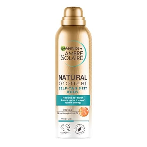 Image of Garnier Ambre Solaire Fake Tan, Natural Bronzer Quick Drying Medium Self Tan Body Mist, Streak Free Fake Tan, Lasts Up to 1 week, Vegan Formula, Radient Glow For All Skin Types, 150ml (Pack of 1)