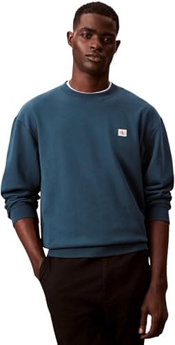 Image of Calvin Klein Men's LS 350TERRY EU WHSL BADGE CREWNE LV04RC273G Sweatshirts, BLUE (Navy Teal), M