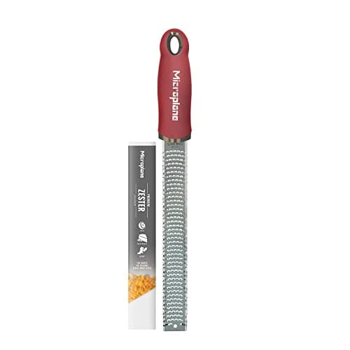 Image of Microplane Zester Grater in Pomegranate Red for Citrus Fruits, Hard Cheese, Ginger, Chocolate and Nutmeg with Fine Stainless Steel Blade - Made in USA