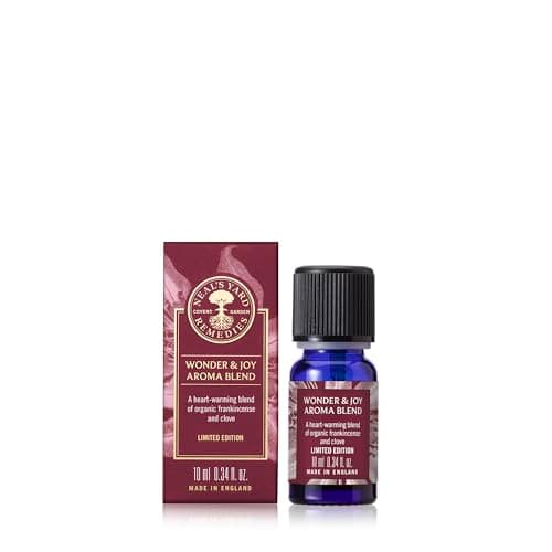 Image of Neal's Yard Remedies Wonder & Joy Aroma Oil Blend, Frankincense, Mandarin, and Clove Essential Oils, Vegan & Cruelty-Free