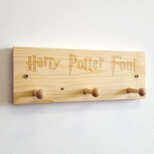 Image of Cutncraft Designs Personalised Shaker Peg Rail - Personalized Wooden Coat Hooks with Laser Engraved Any Name 31 x 11.5cm (12" x 4.5") in Harry Potter Font